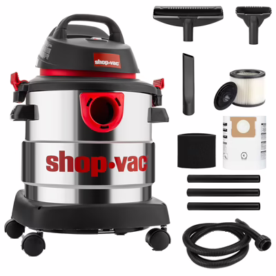 a small silver shop vac with red accents and black wheels alongside it's full range of hoses and nozzles